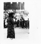 Buzzo marches in Homecoming parade by SUNY Geneseo